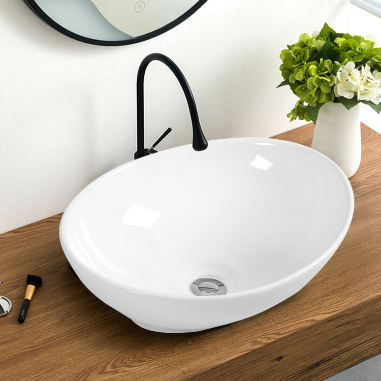 Lavandino da bagno in ceramica moderno a forma di uovo ovale bianco sopra il bancone